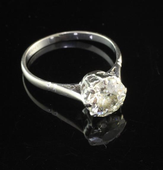 An 18ct white gold and solitaire diamond ring, size O.